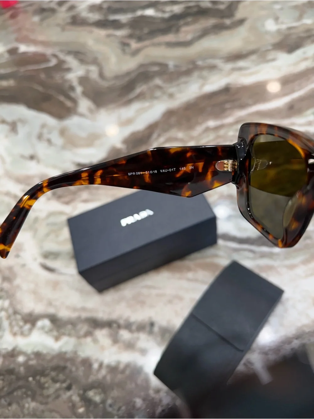 Prada Woman’s Tortoiseshell Rectangular Sunglasses with Brown Lenses